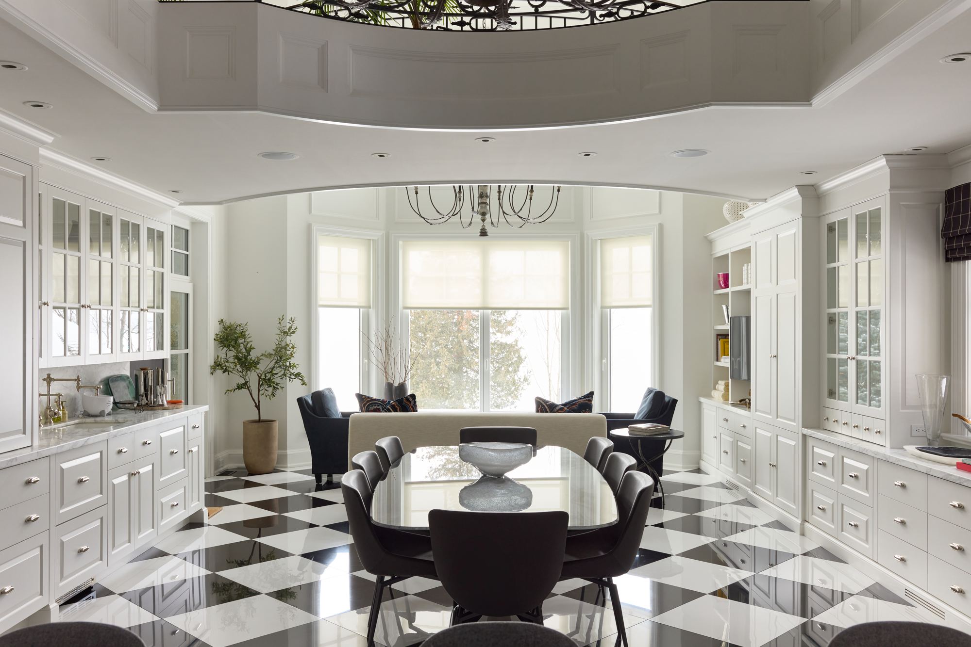 New contemporary kitchen with recessed lighting and a linear light in the ceiling