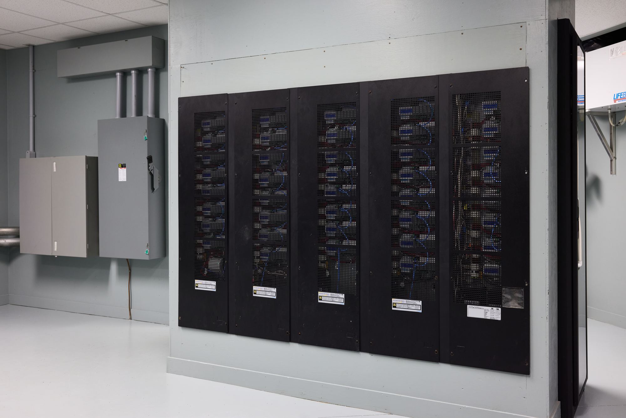 Lutron lighting control panels installed and trimmed out by the Adom team