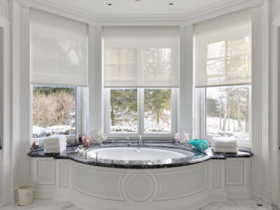 Motorized shades by Lutron in Bathroom